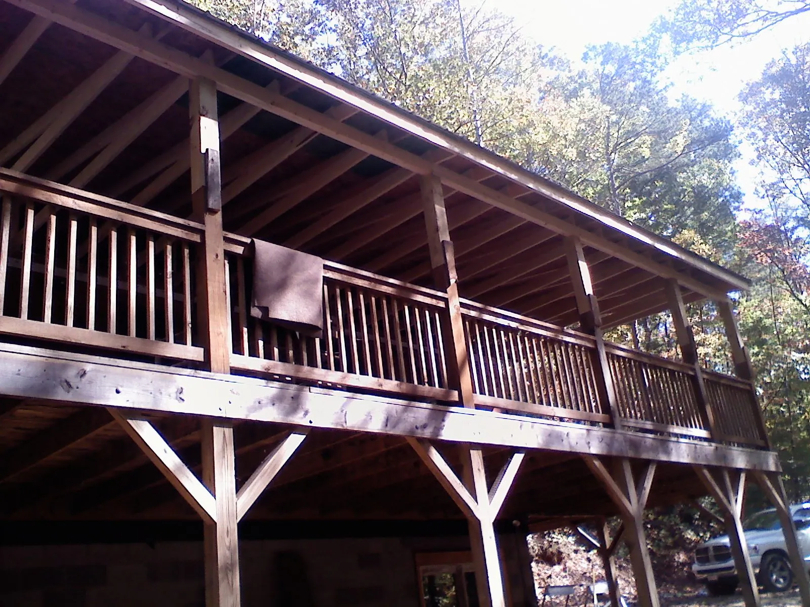 Timber framing under a new elevated porch and deck — Roof Leak Repair in Novato by Roofing Brothers